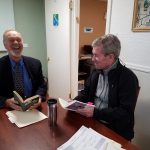 Two men at Globelink Foreign Language Center having a conversation